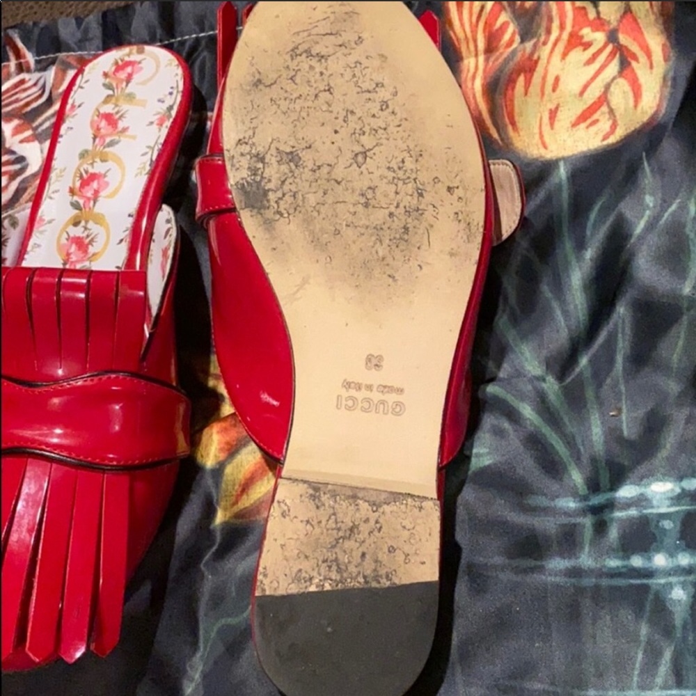 Gucci. red shoe